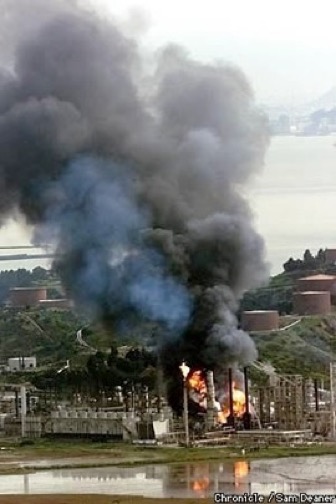 Huge Explosion Rocks Richmond Oil Refinery / Thousands ordered indoors 3 hurt responding to blast. A huge plume of smoke rose above the Chevron refinery inRichmond, as firefighters battled the blaze. San Francisco Chronicle Photo by Sam Deaner